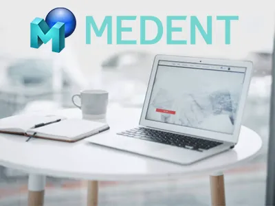MEDENT logo above a laptop on a table